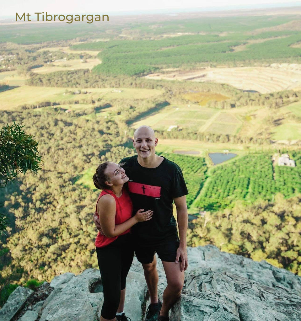 Nyle & Emma from The Timeless Collection hiking Mount Tibrogargan