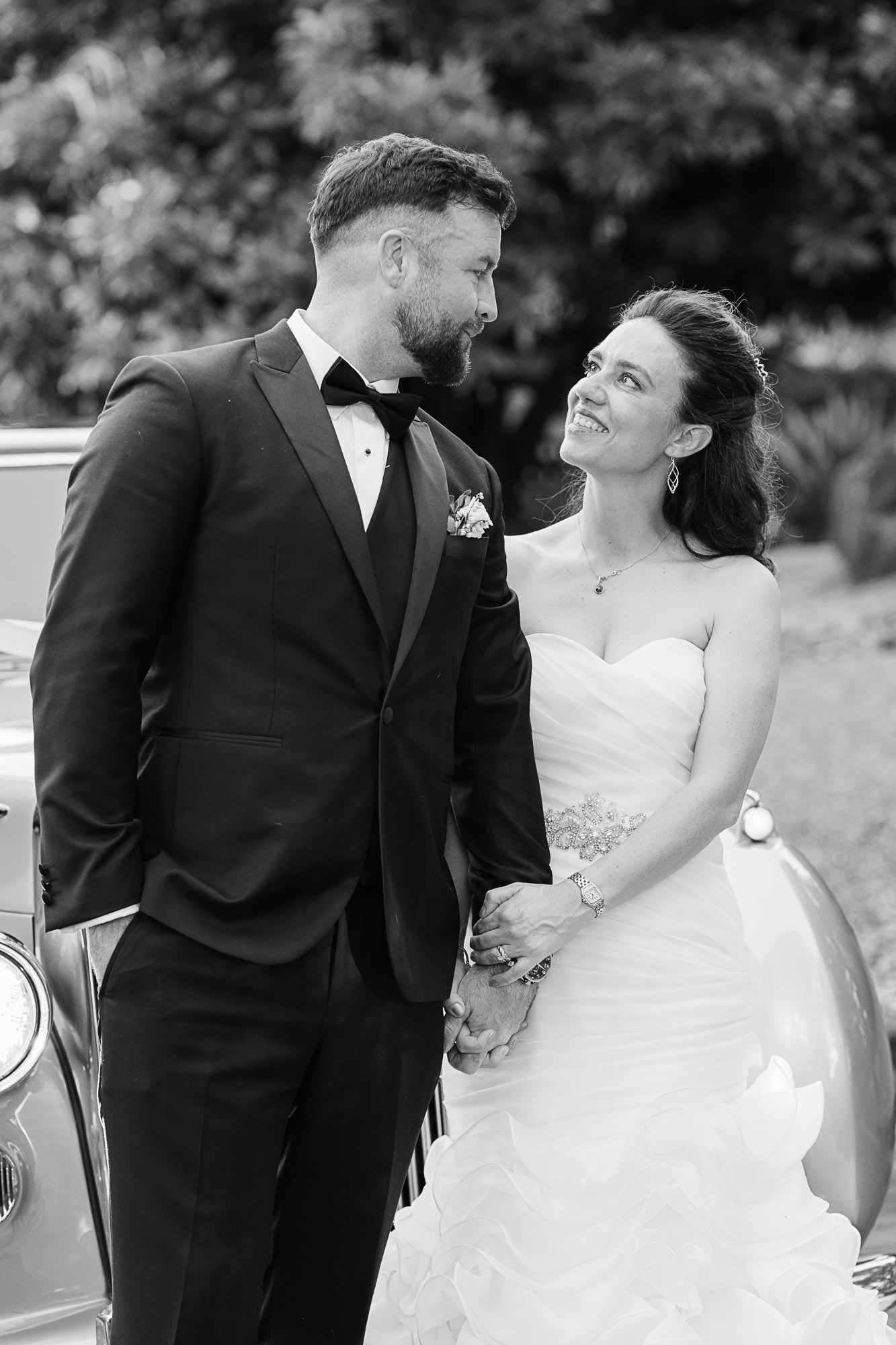 Bride and groom sharing a candid moment together after their wedding ceremony at a private Airbnb in Cooroy, Noosa, photographed by a Sunshine Coast wedding photographer.